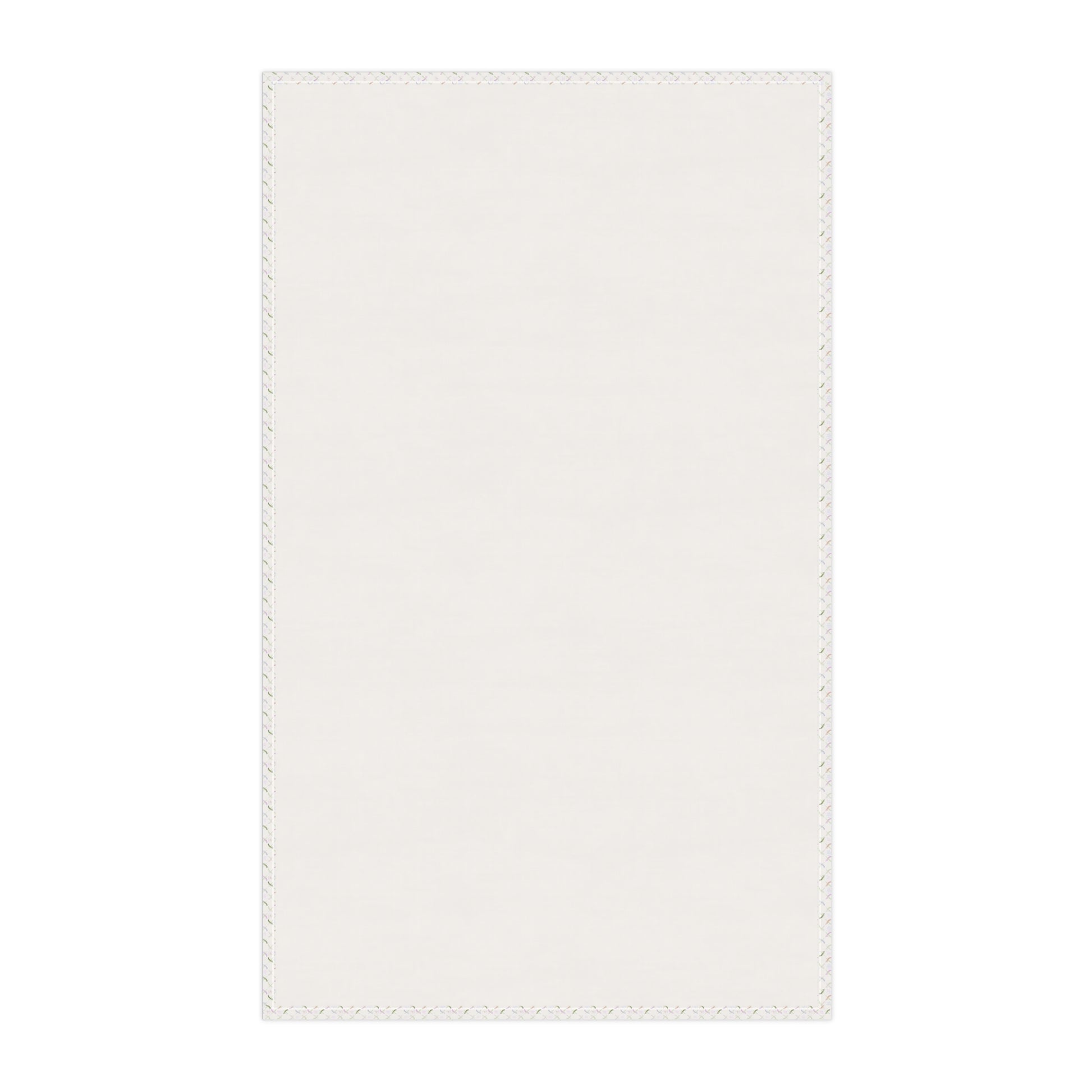 Background of  the back side of tea towel showing white background and floral border