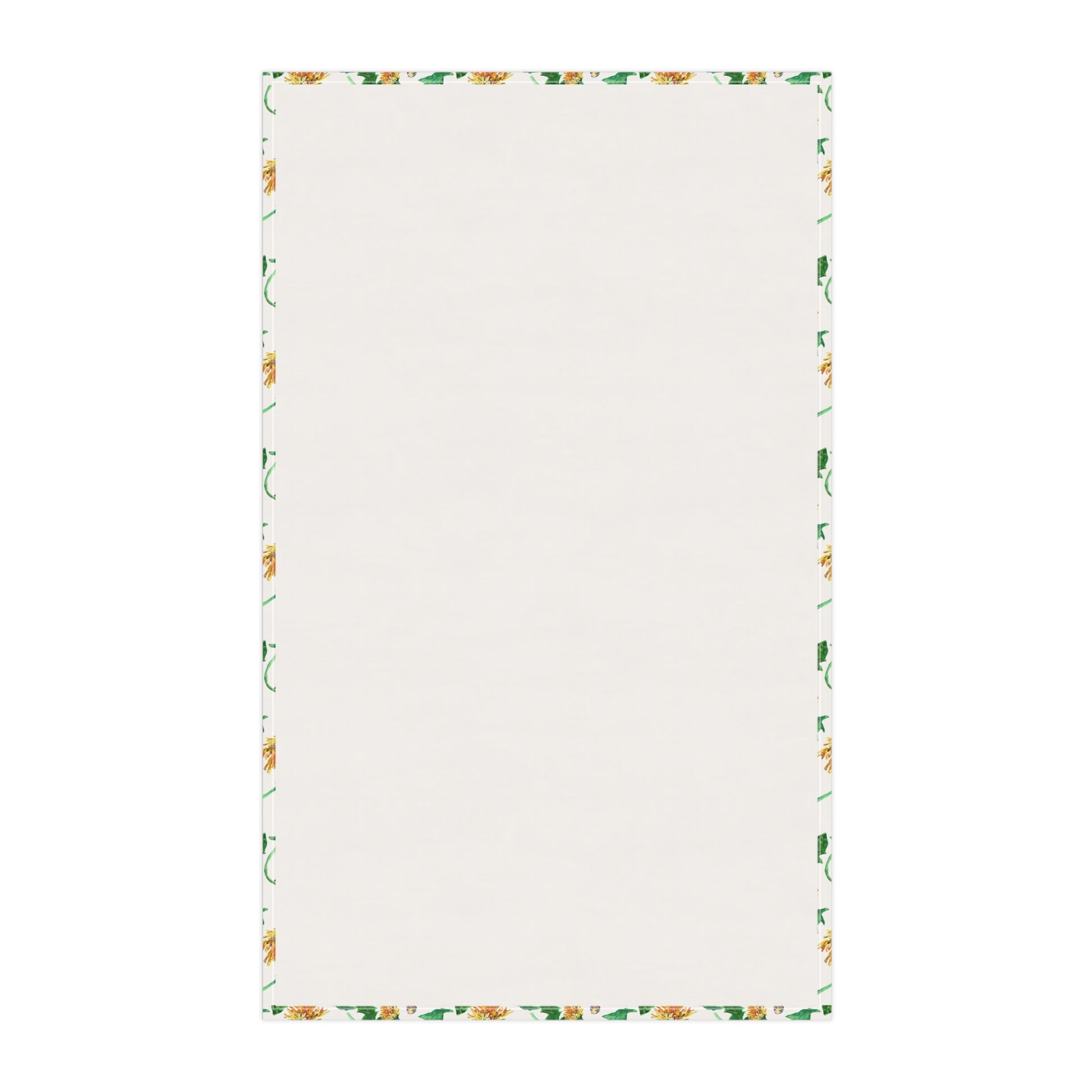 Reverse side of kitchen towel showing dandelion floral edges