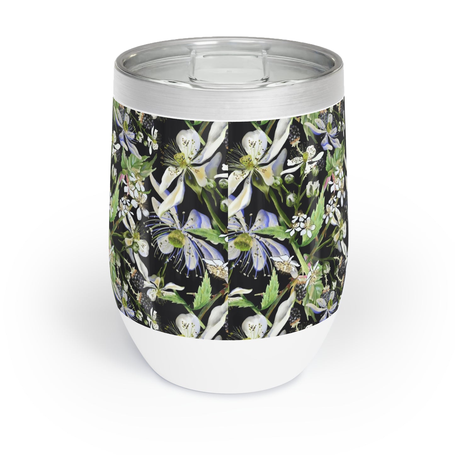 White tumbler with floral design on a black background