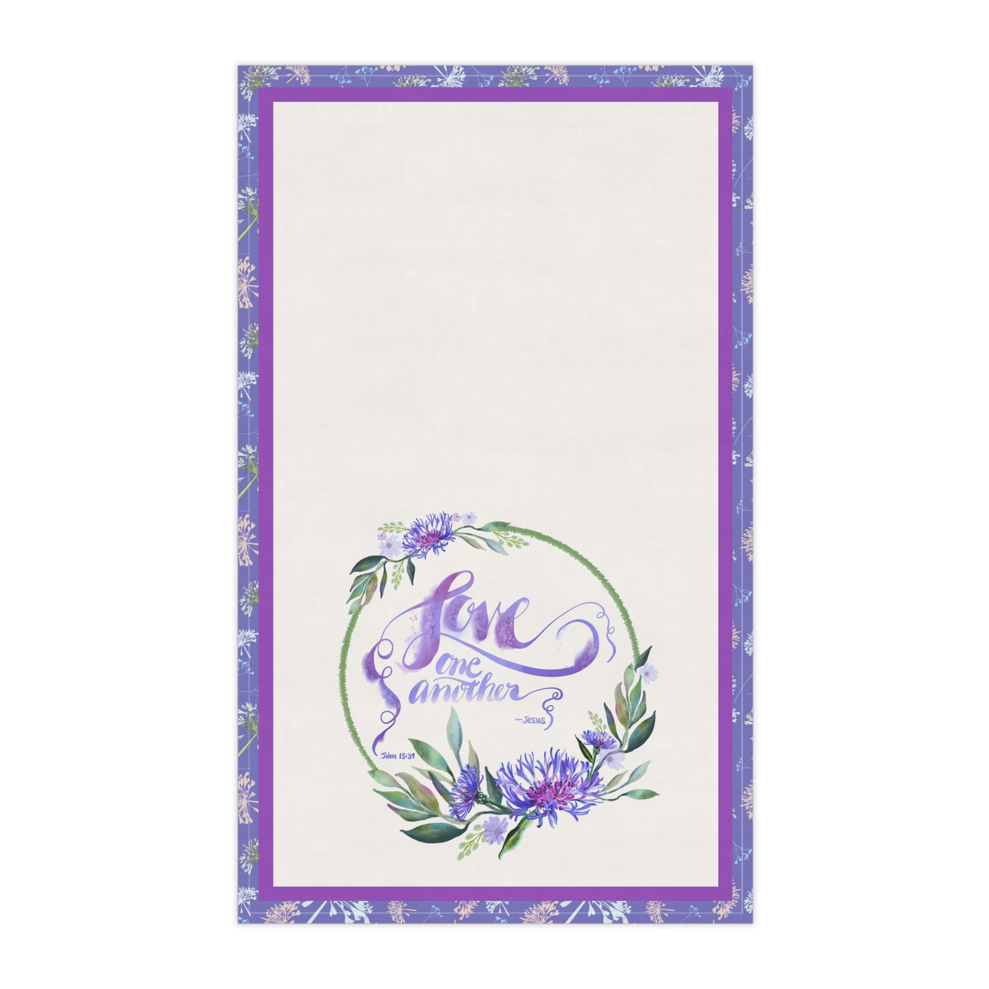 Decorative kitchen tea towel with floral design and 'Love One Another' text on a white background