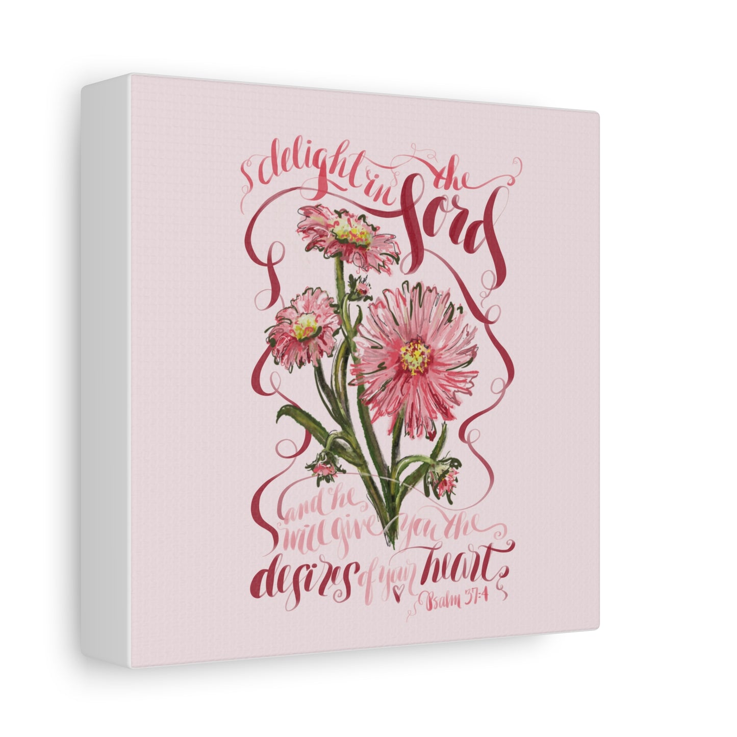 Side view of Canvas print with pink flowers and Bible Verse Desires of Your Heart on a light pink background
