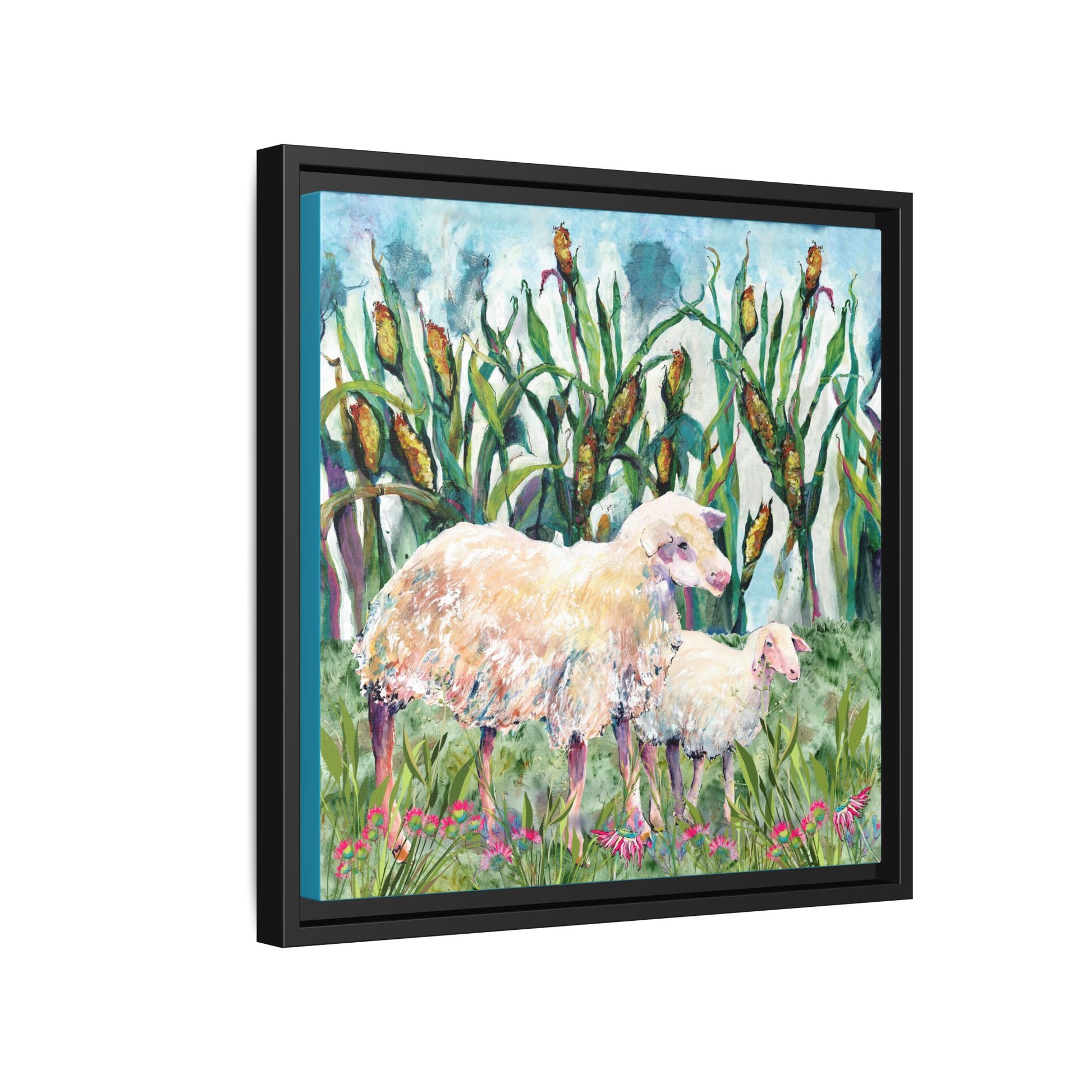 Framed artwork of two sheep in a field with tall grass and flowers. Side View Black frame