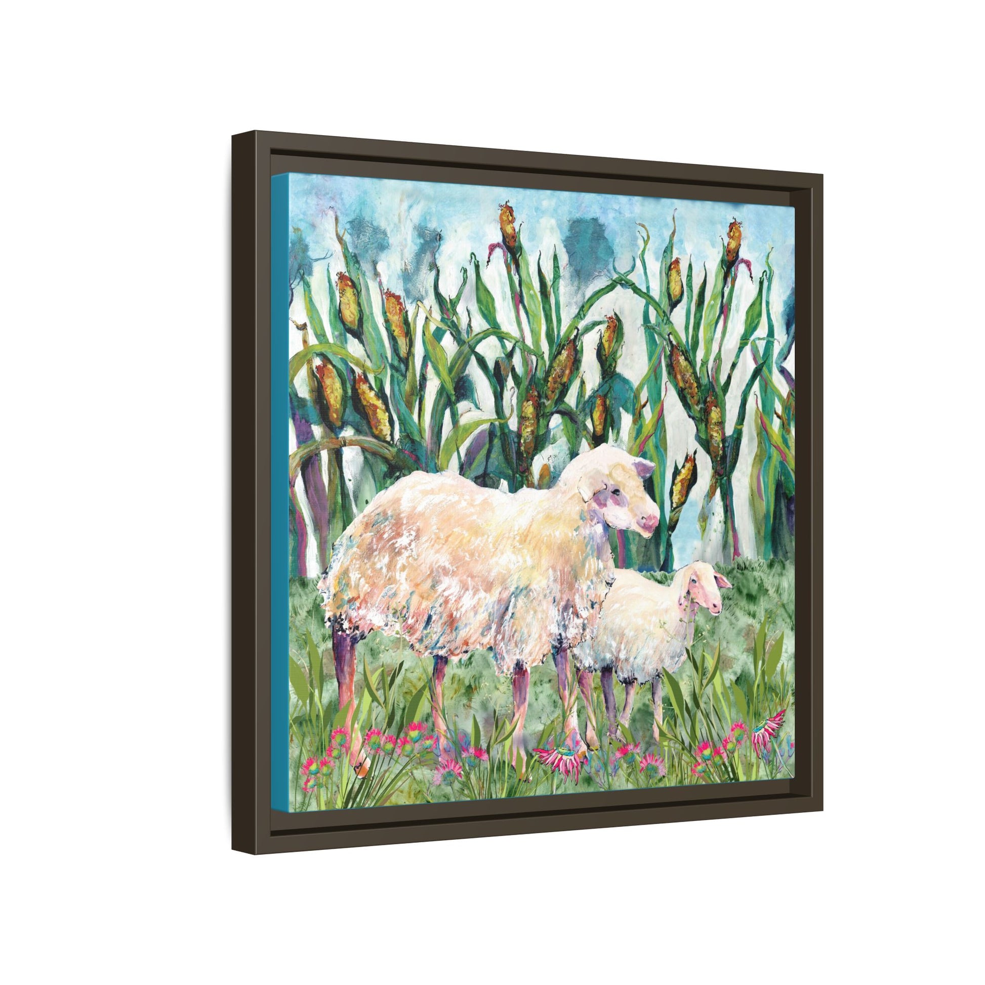 Side view Framed artwork of two sheep in a field with tall grass and flowers. Espresso Frame