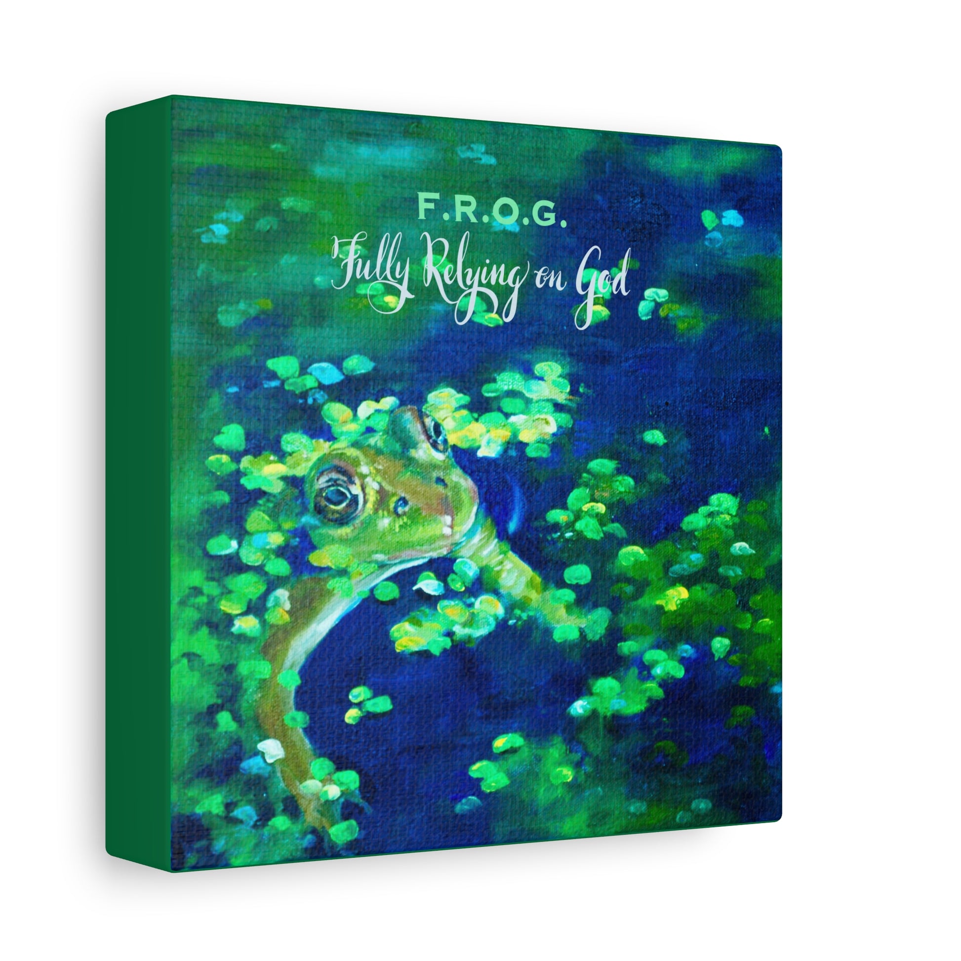 Side view of Canvas print of a frog and 'F.R.O.G. Fully Relying on God' text against a green and blue background.
