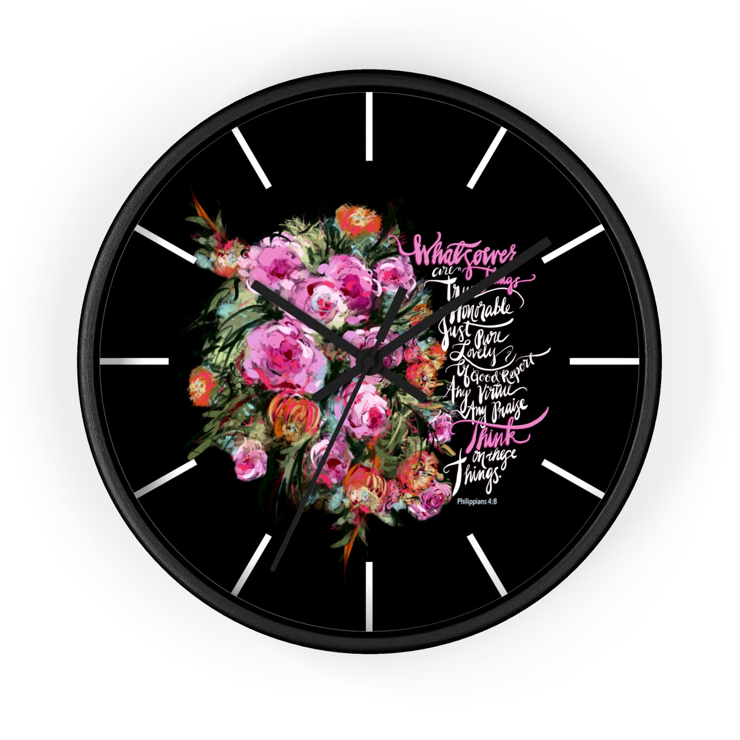 Wall clock with floral design and text on a black background