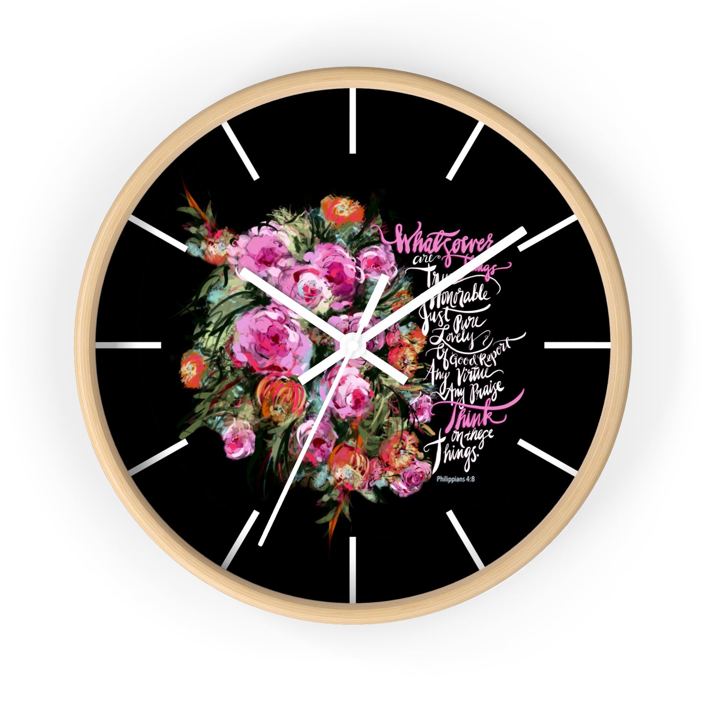 Wall clock with floral design and text on a black background